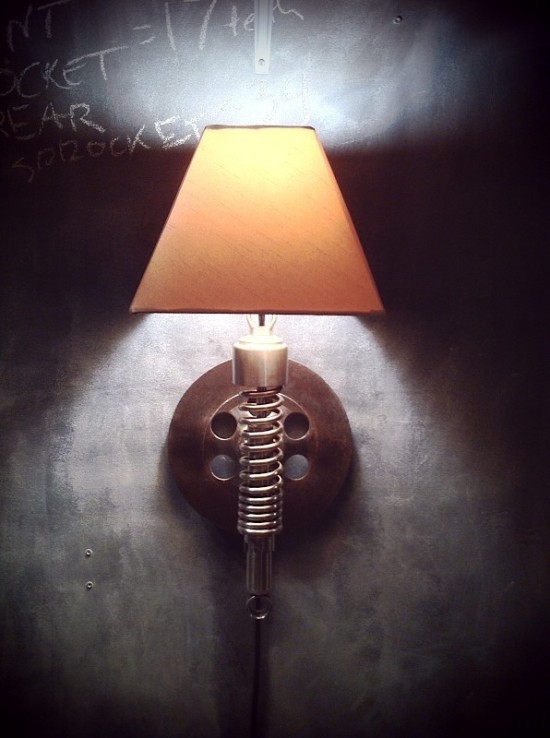 recycled motorbike parts wall lamp